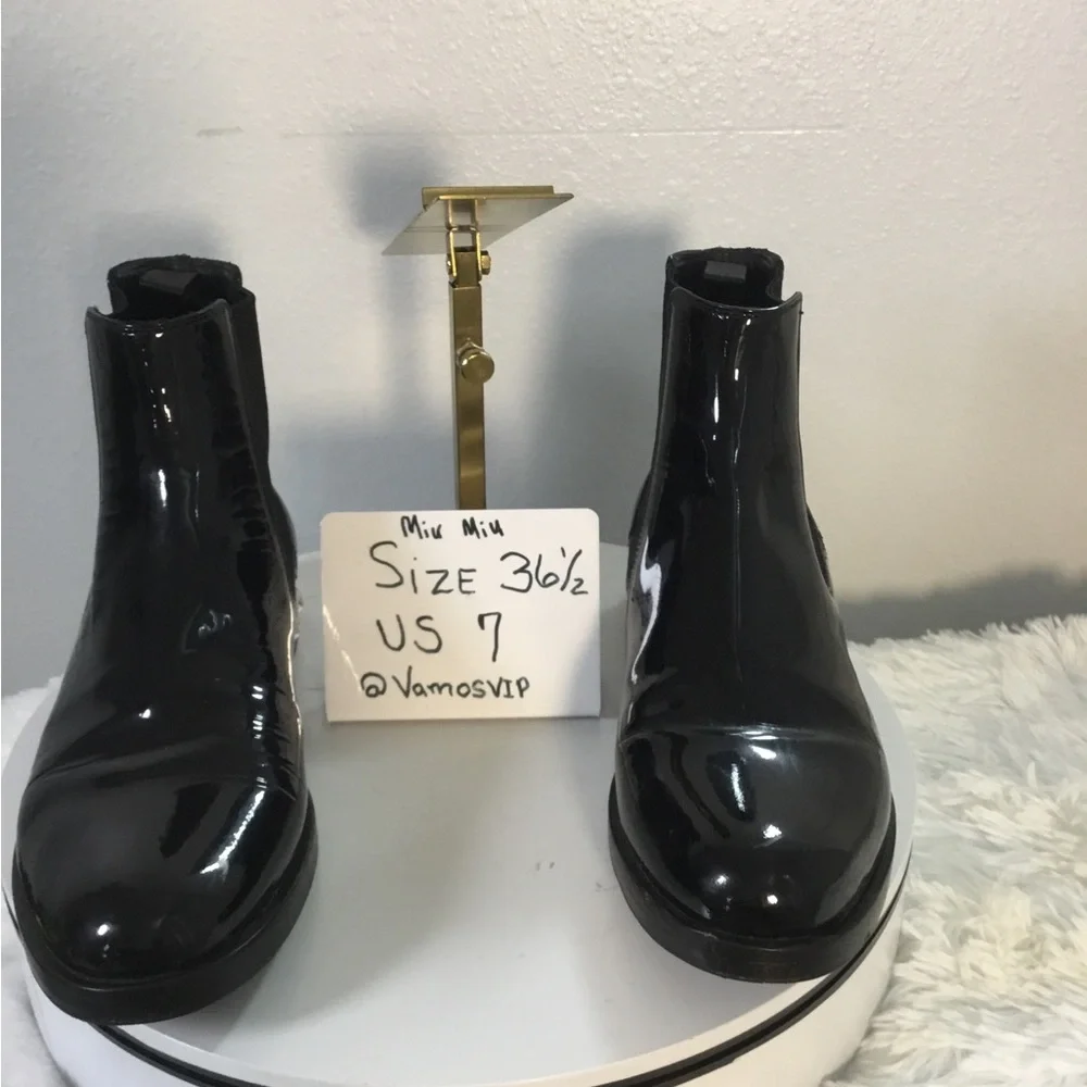Miu Miu Patent Leather Black Ankle Boots with Crystal Heel Accent